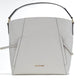 Michael Kors Evie Large Pebbled Leather Hobo Shoulder Bag Handbag (Light Cream)