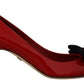 Dolce & Gabbana Elegant Patent Leather Heels with Chic Bow Accent