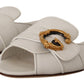 Dolce & Gabbana Elegant White Flat Sandals with DG Logo Embellishment