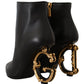 Dolce & Gabbana Elegant Black Leather Ankle Boots with Gold Detailing