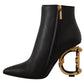 Dolce & Gabbana Elegant Black Leather Ankle Boots with Gold Detailing