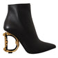 Dolce & Gabbana Elegant Black Leather Ankle Boots with Gold Detailing