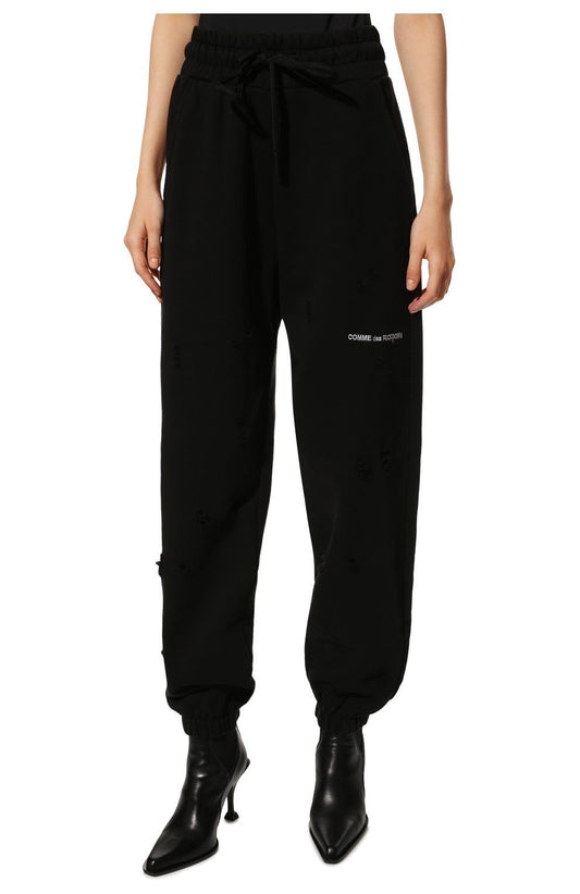 Comme Des Fuckdown Urban Edge Cotton Trousers with Chic Distressing