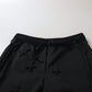 Dolce & Gabbana Elegant Tapered Lace-Up Mid Waist Pants