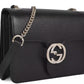 Gucci Elegant Black Leather Shoulder Bag with Silver Charm