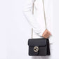 Gucci Elegant Black Leather Shoulder Bag with Silver Charm