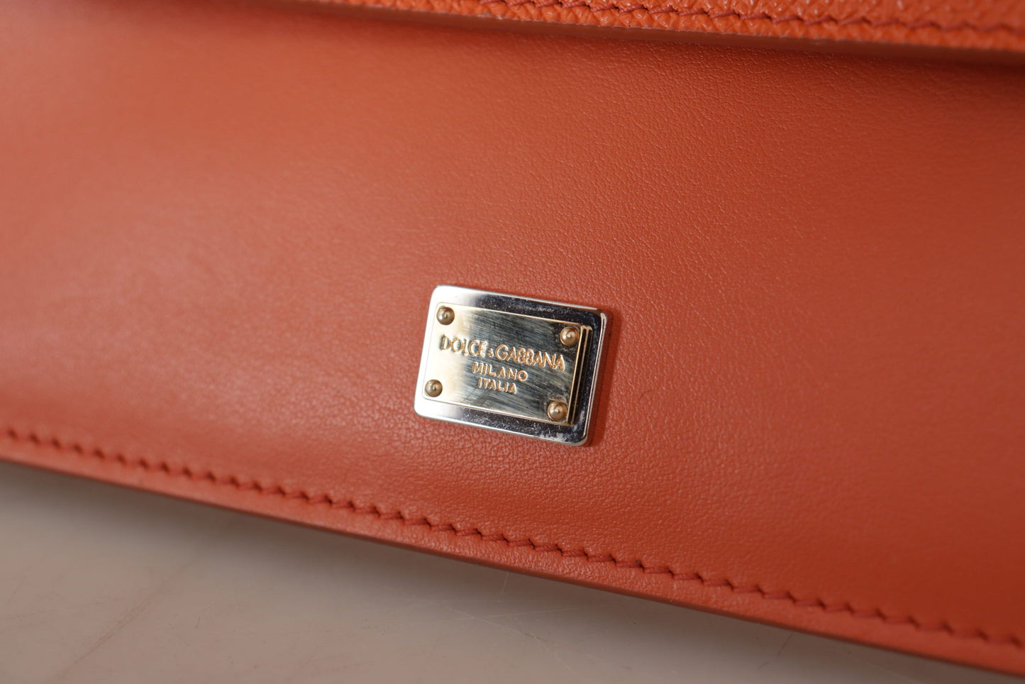 Dolce & Gabbana Exquisite Orange Leather Clutch with Gold Accents