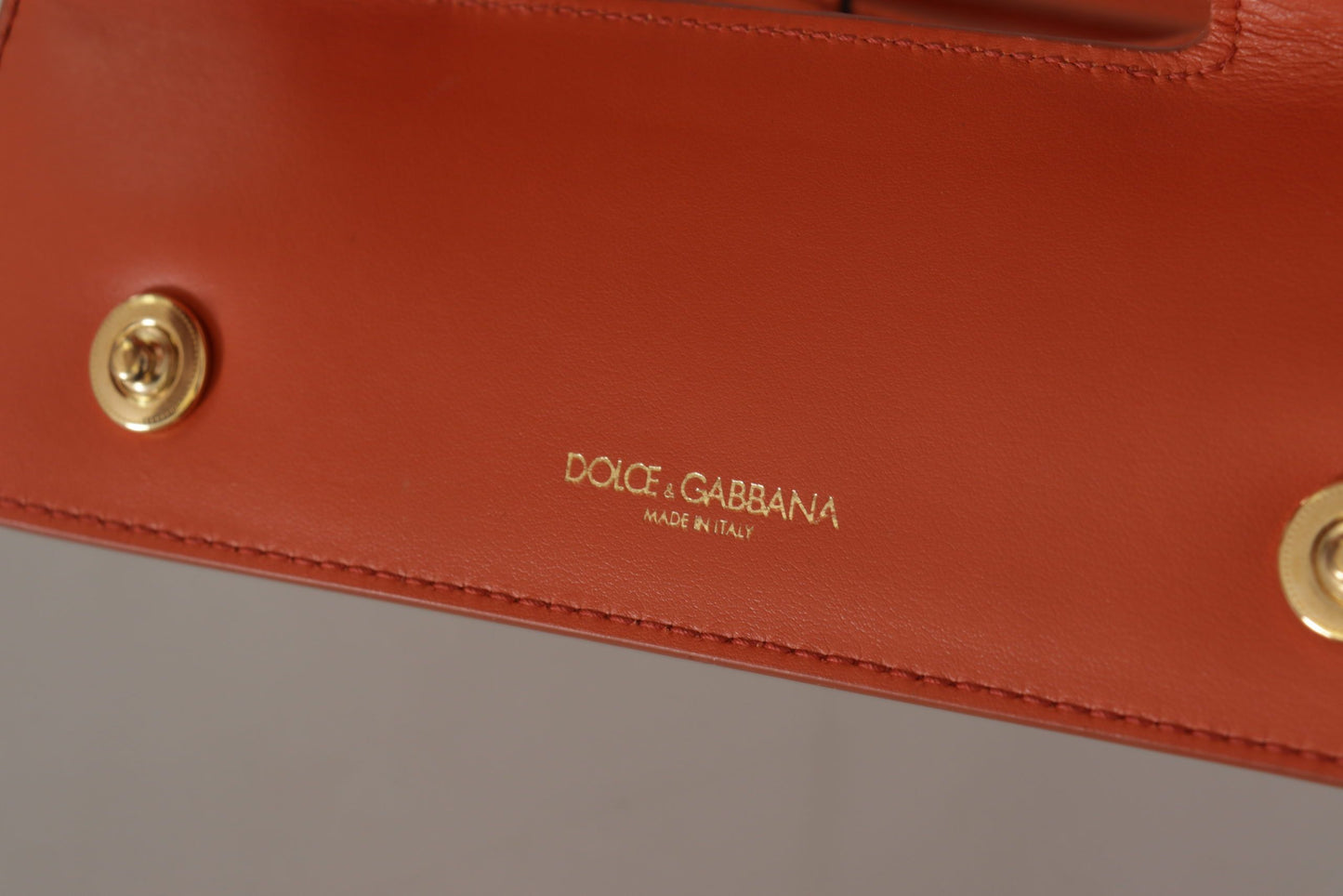 Dolce & Gabbana Exquisite Orange Leather Clutch with Gold Accents