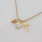 Dolce & Gabbana Elegant Gold Tone Charm Necklace with Cross Pendant