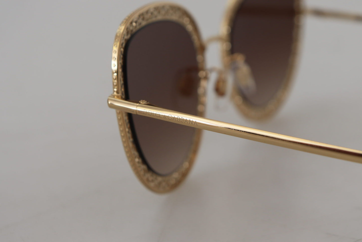 Dolce & Gabbana Elegant Lace-Patterned Gold Sunglasses